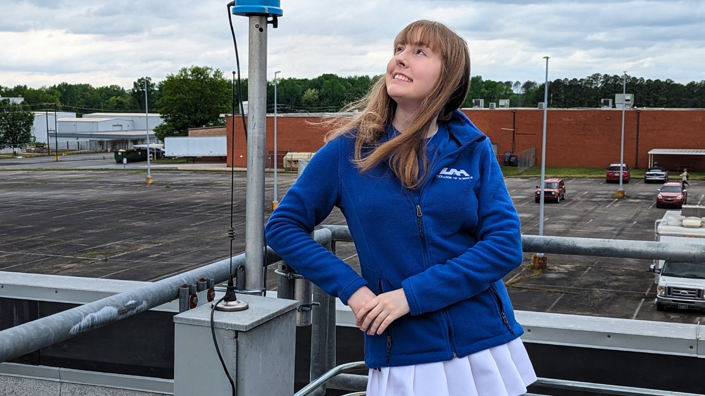 Janna Jones Atmospheric and Earth Science senior student on top of the UAH SWIRLL building